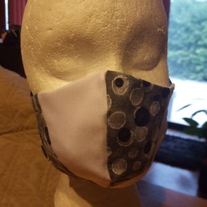 Two-Toned Black and White Face Mask.